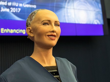 Picture of the lifelike robot, Sophia,smiling.